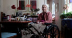 Female nursing home resident in wheelchair