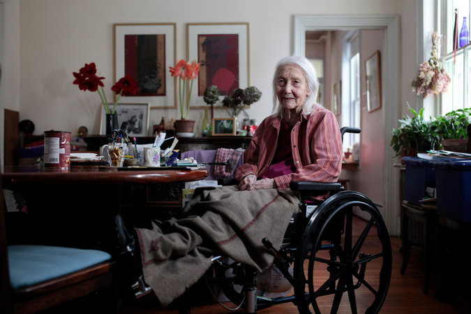 Female nursing home resident in wheelchair